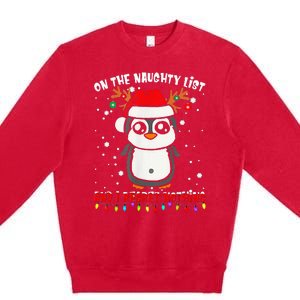 On The Naughty List And I Regret Nothing Funny Penguin Xmas Premium Crewneck Sweatshirt