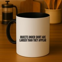 Objects Under Shi Rt Are Larger Than They Appear Mug