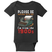 Please Be Patient With Me IM From The 1900 Retro Typewriter Baby Bodysuit