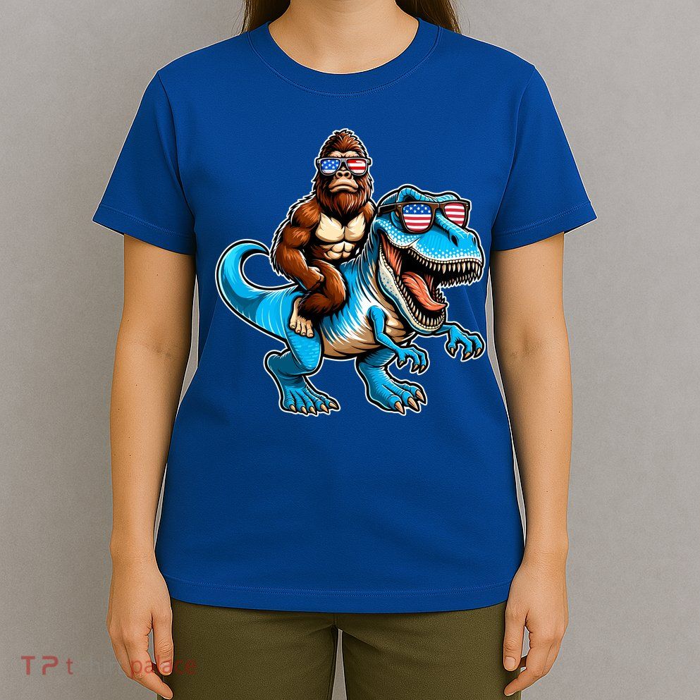 Patriotic Bigfoot Riding T Rex T-Shirt