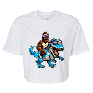 Patriotic Bigfoot Riding T Rex Bella+Canvas Jersey Crop Tee