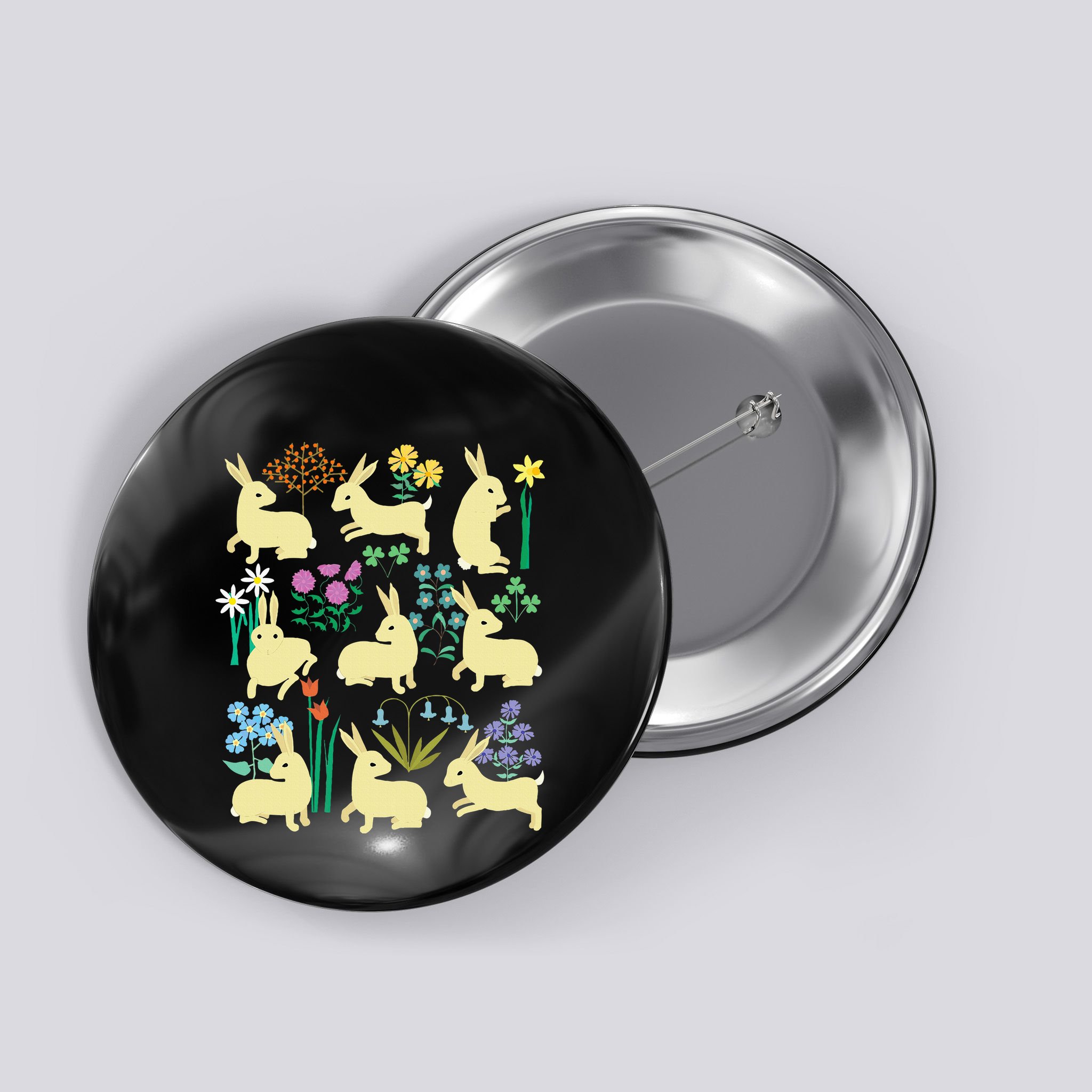 Playful Little Rabbits Among Colorful Flowers Button