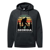 Printed on Back Georgia and a Bigfoot or a Sasquatch Performance Fleece Hoodie