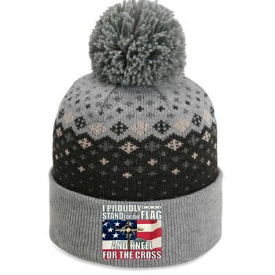 Proudly Stand For The Flag And Kneel For The Cross The Baniff Cuffed Pom Beanie