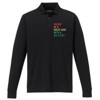 Raised By A Great Man With A Big Heart vintage Father’s Day Performance Long Sleeve Polo