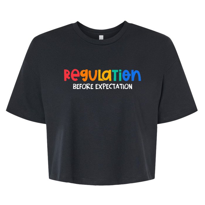 Regulation Before Expectation Autism Awareness Bella+Canvas Jersey Crop Tee