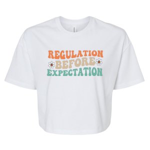 Regulation Before Expectation Retro Neurodiversity Therapist Bella+Canvas Jersey Crop Tee