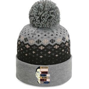 RBG Never Underestimate Power of Girl With Book The Baniff Cuffed Pom Beanie