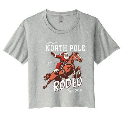 Retro Country Western Santa On Bucking Horse Christmas Women's Crop Top Tee