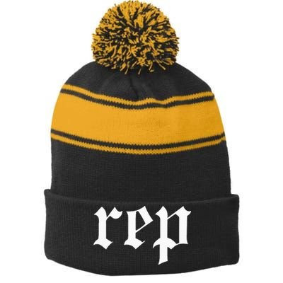 Rep Expression Stripe Pom Pom Beanie