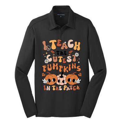 Retro Fall Halloween I Teach The Cutest Pumpkin In The Patch Gift Silk Touch Performance Long Sleeve Polo