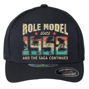 Role Model Born 1958 And The Saga Continues Birthday Flexfit Unipanel Trucker Cap