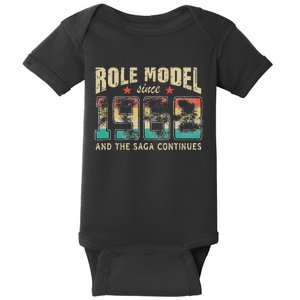 Role Model Born 1968 And The Saga Continues Birthday Baby Bodysuit