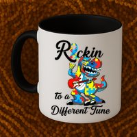 Rockin To A Different Tune Autism Dinosaur Mug