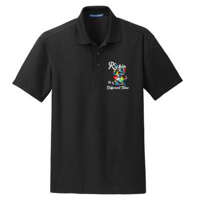 Rockin To A Different Tune Autism Dinosaur Dry Zone Grid Polo