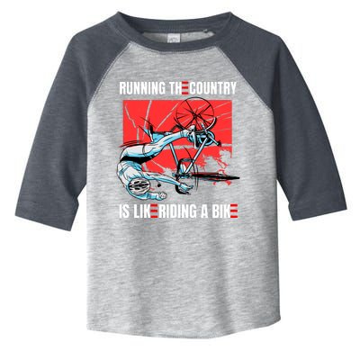 Running The Country Is Like Riding A Bike Merry 4th Of July Biden Falling Toddler Fine Jersey T-Shirt