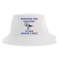 Running The Country Is Like Riding A Bike Biden Falling Meme Sustainable Bucket Hat