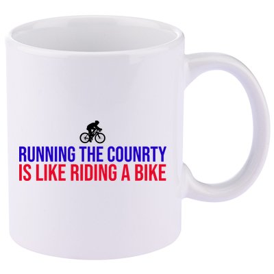 Running The Country Is Like Riding A Bike Joe Biden Funny 11oz C Handle Ceramic Mug