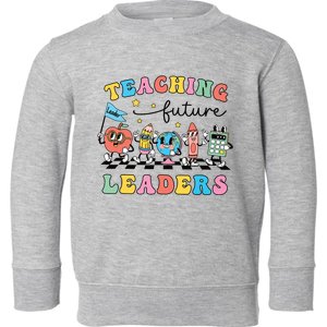 Retro Teaching Future Leaders Groovy Teacher Back To School Toddler Sweatshirt