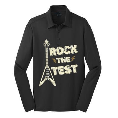 Rock The Test Guitar Testing Day Teacher Test Day Teacher Silk Touch Performance Long Sleeve Polo