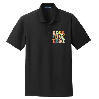 Rock The Test Groovy Design Funny Testing Day Teacher Dry Zone Grid Polo