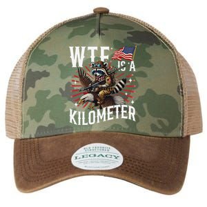 Retro Wtf Is A Kilometer Raccoon Eagle Legacy Tie Dye Trucker Hat