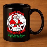 Santa Claus Doesn't Exist But I cant Read 11oz C Handle Ceramic Mug