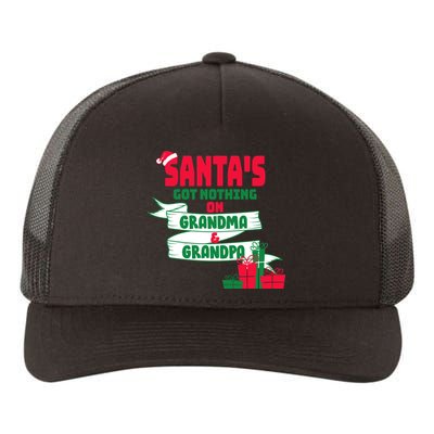 Santa's Got Nothing On Grandma And Grandpa Christmas Yupoong Adult 5-Panel Trucker Hat