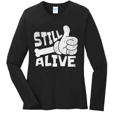 Still Alive Skeleton Hand Dark Humor Graphic Ladies Long Sleeve Shirt