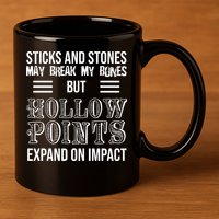 Sticks And Stones May Break My Bones But Hollow Points Expand On Impact 11oz C Handle Ceramic Mug