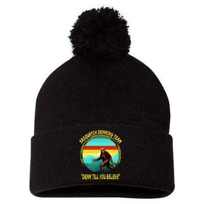 Sasquatch Drinking Team Drink Till You Believe Pom Pom 12in Knit Beanie