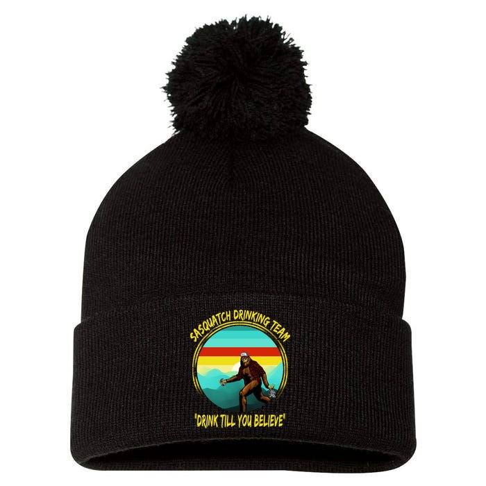 Sasquatch Drinking Team Drink Till You Believe Pom Pom 12in Knit Beanie