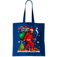 Santa Bigfoot Holding Hockey Equipt Xmas Player Lover Gift Tote Bag