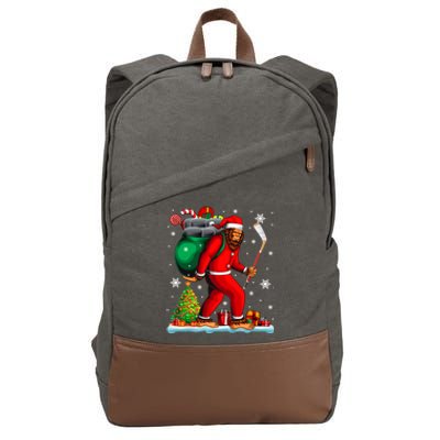 Santa Bigfoot Holding Hockey Equipt Xmas Player Lover Gift Cotton Canvas Backpack