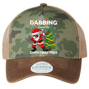 Santa Dabbing Around The Christmas Tree Lights Legacy Tie Dye Trucker Hat