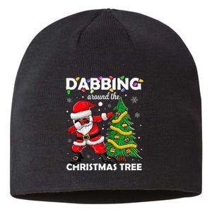 Santa Dabbing Around The Christmas Tree Lights Sustainable Beanie