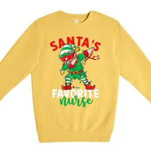 Santas Favorite Nurse Dabbing Elf Christmas Pajama Holiday Funny Gift Premium Crewneck Sweatshirt