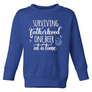 Surviving Fatherhood One Beer At A Time Funny Dad Joke Quote Great Gift Toddler Sweatshirt