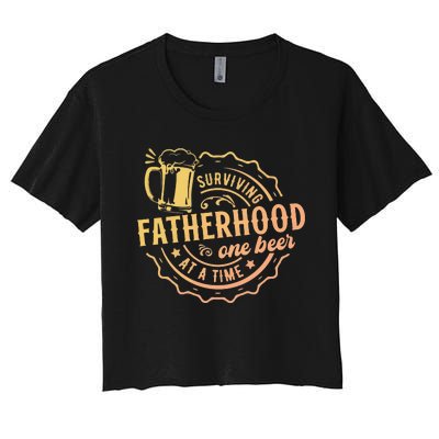 Surviving Fatherhood One Beer At A Time Women's Crop Top Tee