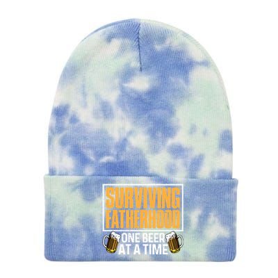 Surviving Fatherhood One Beer At A Time Funny Ing Cool Gift Tie Dye 12in Knit Beanie