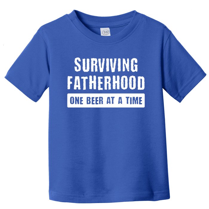 Surviving Fatherhood One Beer At A Time Cool Gift Funny Dad Gift Toddler T-Shirt