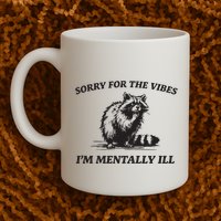 Sorry For The Vibes IM Mentally Ill Funny Raccoon Meme Mug