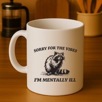 Sorry For The Vibes IM Mentally Ill Funny Raccoon Meme Mug