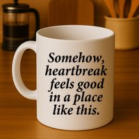 Somehow Heartbreak Feels Good In A Place Like This Mug