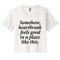 Somehow Heartbreak Feels Good In A Place Like This Women's Crop Top Tee