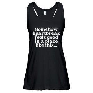 Somehow Heartbreak Feels Good In A Place Like This Ladies Essential Flowy Tank