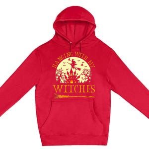 Spooky Halloween Witch Design with Broom and Bat Premium Pullover Hoodie