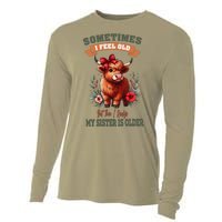 Sometimes I Feel Old But My Sister Is Older Funny Meme Cow Cooling Performance Long Sleeve Crew