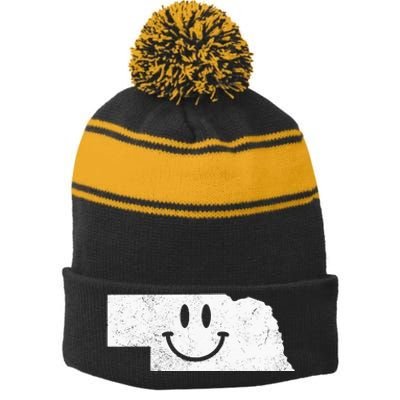 Smiling In NE – Funny Nebraska Happy Face Stripe Pom Pom Beanie