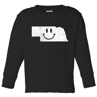 Smiling In NE – Funny Nebraska Happy Face Toddler Long Sleeve Shirt